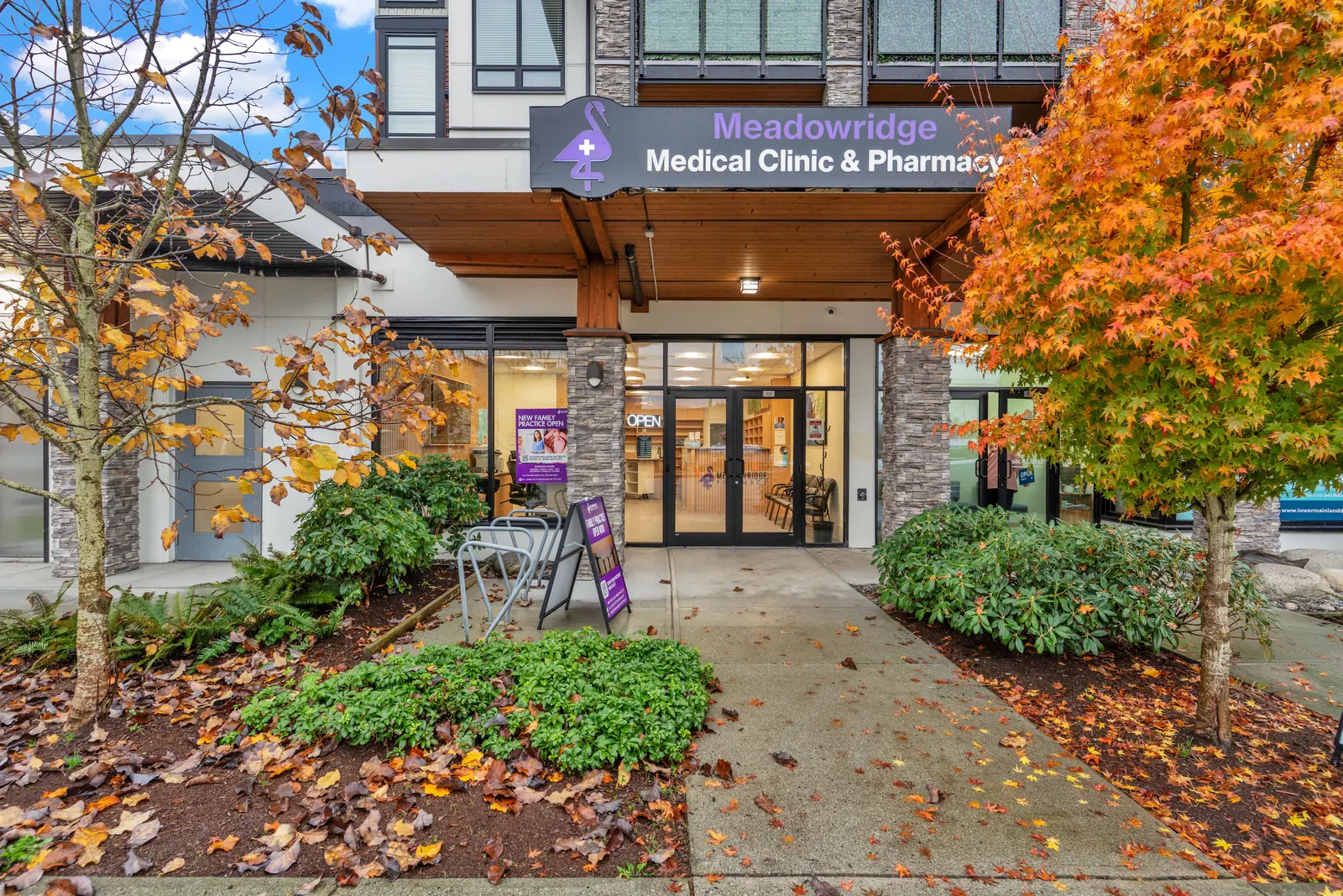 Entrance to Meadowridge Medical Clinic and Pharmacy under the purple sign